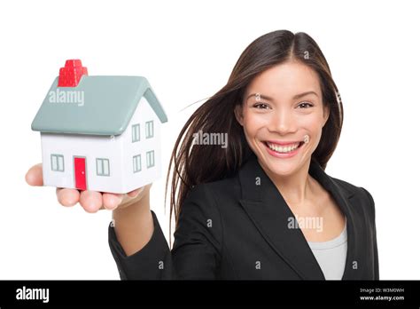 Real Estate Agent Selling Home Holding Mini House Female Realtor In