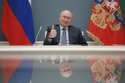 putin signs law allowing him to serve 2 more terms abs cbn news