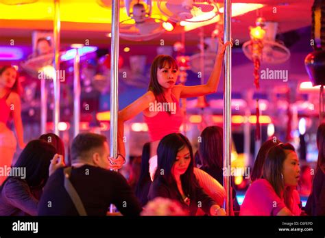 Young Sexy Thai Girls Performing Pole Dancing In Pattaya Gogo Bar In Walking Street Pattaya