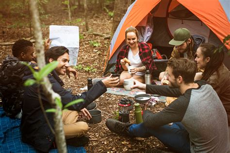 Friends Camping In The Forest Together Stock Photo Download Image Now