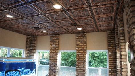 A tin ceiling is an architectural element, consisting of a ceiling finished with plates of tin with designs pressed into them, that was very popular in victorian buildings in north america in the late 19th and early 20th century. Faux Tin Ceiling Projects | Decorative Ceiling Tiles Inc.