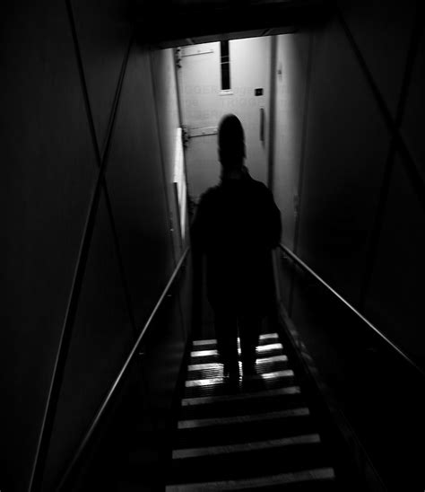 Man In Dark Stairway Trigger Image