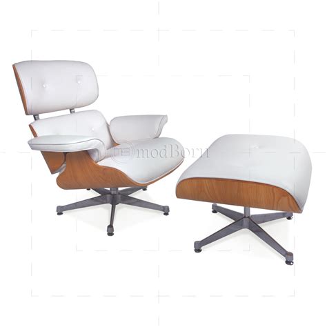 The lounge chair and ottoman can be seen in museum collections and designer homes across the globe, and it remains a symbol of luxurious comfort. Lounge Chair and Ottoman White Leather ASH Plywood