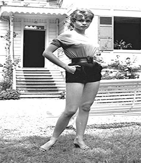 Amazon Com Posterazzi Dap Brigitte Bardot Standing In Shorts On Lawn Photo Print X