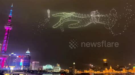 Hundreds Of Illuminated Drones Display Marriage Proposal Show In