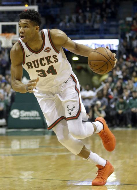 Giannis antetokounmpo and his two younger brothers were running around chasing each other. Giannis Antetokounmpo's Shoes Had to Be Shared With His ...