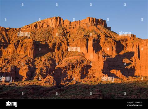 Sunset Light On Wray Mesa And The Fisher Towers Near Moab Utah Stock