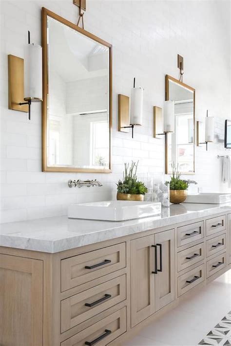 A wooden cabinet made from 18mm water resistant pine ply. Bathroom Trend: Warm Wood Vanities - BECKI OWENS