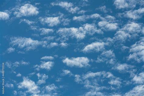 Puffy White Clouds In Blue Sky Stock Photo Adobe Stock
