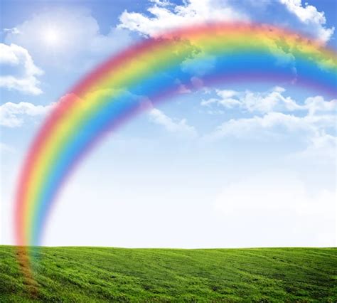 Rainbow In The Blue Sky Stock Photo By ©zhanna 6407262