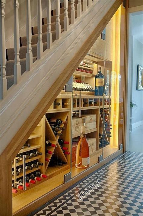 Their daughter has been equally understanding in letting me invest. Wine storage - under staircase | Staircase storage, Wine ...