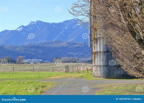 Silo And Cascade Mountain Range In Bc Canada Stock Image Image Of