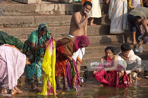 Indian Hindu Pilgrims Bathing In The Ganges River At Dashashwamedh