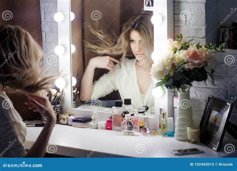 Amazing Young Woman Doing Her Makeup In Front Of Mirror Portrait Of Beautiful Girl Near