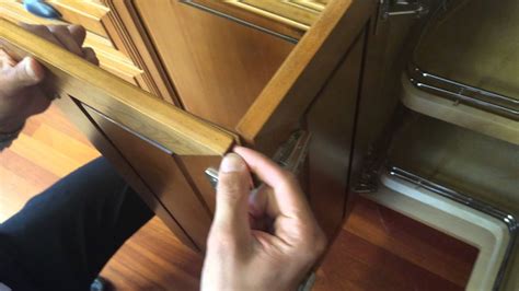 Whether or not you do this, it's important to use a spirit level to make sure all the handles are aligned. how to adjust bi fold doors on a base 90 cabinet built by ...