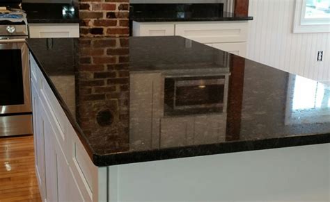 Valle nevado granite counters and black cabinets in the kitchen? Steel Gray Granite - Stone & Cabinets