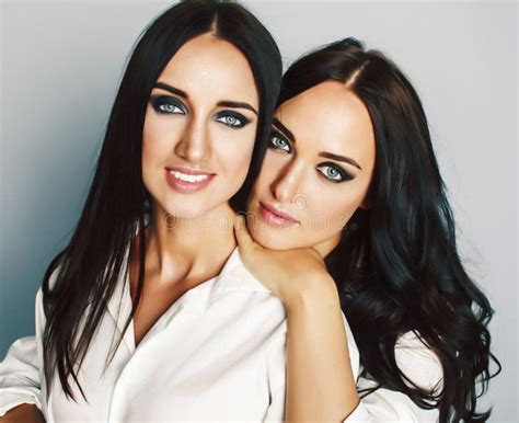 Two Sisters Twins Posing Making Photo Selfie Dressed Same White Shirt