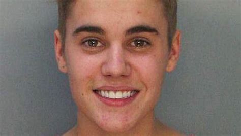 Justin Bieber Leaves Jail Waves To Fans
