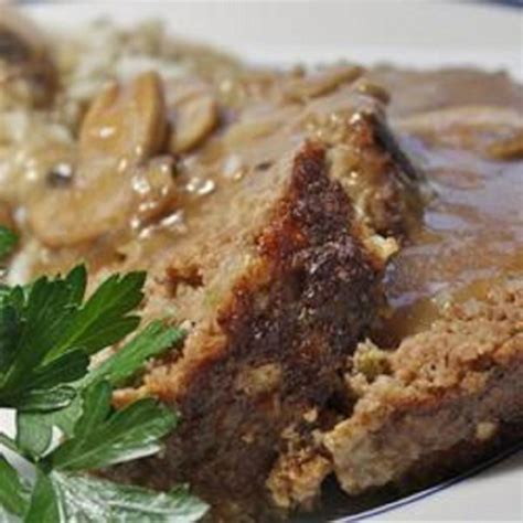 Add the saltines, parsley, onion, and garlic to the bowl. Best Ever Meatloaf with Brown Gravy Photos - Allrecipes.com