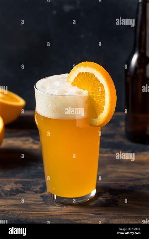 Boozy Belgian Orange Wheat Beer With A Garnish Stock Photo Alamy