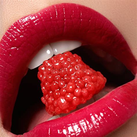 Close Up Of Woman S Lips With Bright Fashion Red Glossy Makeup Macro