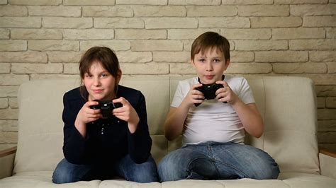 Brother And Sister Play Videogames Stock Video Footage Storyblocks