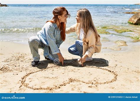 Young Lesbian Couple Of Two Women In Love At The Beach Stock Image Image Of Blonde Friends