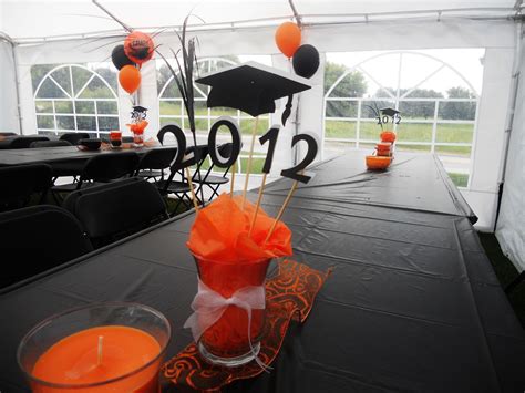 Orange And Black Table Decor For Graduation Party