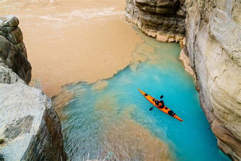 A Kayaker At The Confluence Of Havasu Creek And The Colorado River