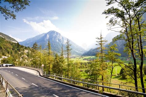 Road To Swiss Village Near A Lake And The Alps Stock Photo Image Of