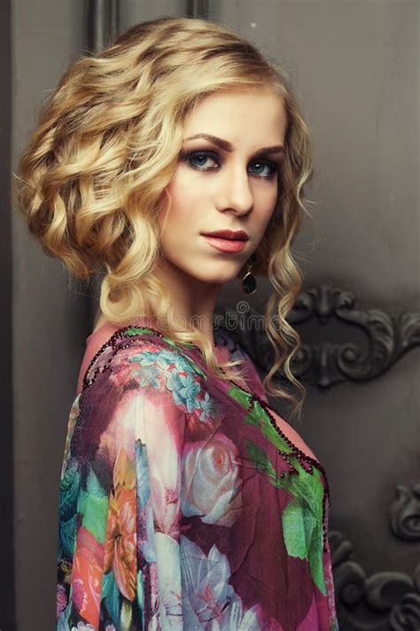 Portrait Of Young Beautiful Blond Lady Wearing Romantic Dress Stock