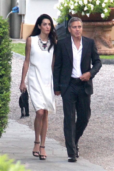 Maybe you would like to learn more about one of these? George Clooney and Amal Alamuddin in Como scouting wedding ...