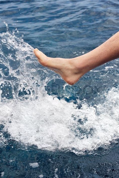Foot Of Young Man In Water Splash Stock Image Colourbox