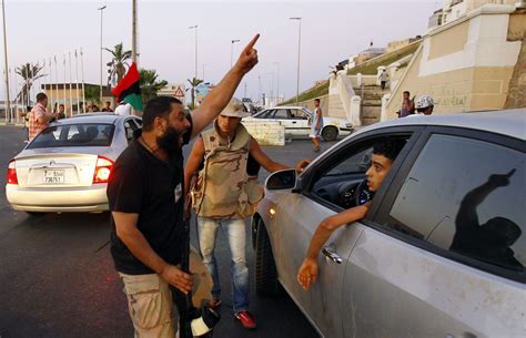 Libyan Rebels Storm Gadhafis Tripoli Compound A Picture Story At The