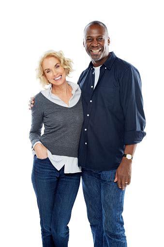 Happy Mature Interracial Couple Standing Together On White