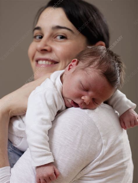 Mother Carrying Sleeping Infant Stock Image F Science