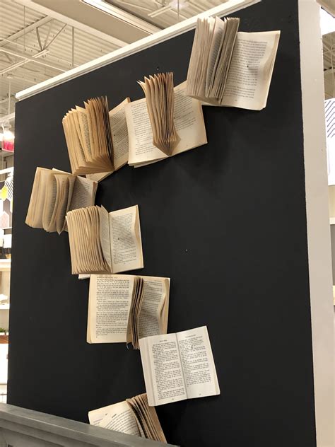Old Book Pages Art Installation On Wall Inspiration Board Design