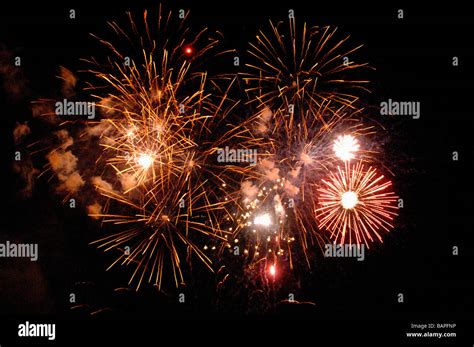 Star Bursts Of Fireworks Light Up The Night Sky With Assorted Colors