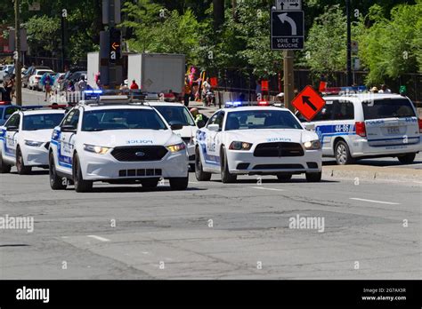 Police Cars On Patrol In Downtown Montreal Quebeccanada Stock Photo