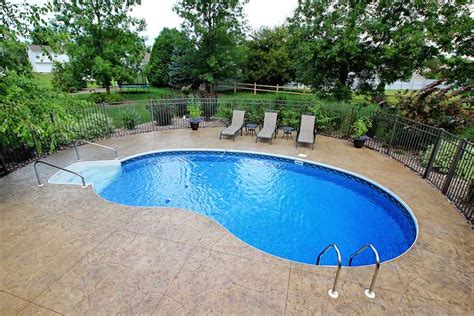 Most concrete swimming pools cost $20,000 to $45,000, not any including decking or patio you add. Patio Backyard Small Pool Inground Designs Outdoor Garden ...