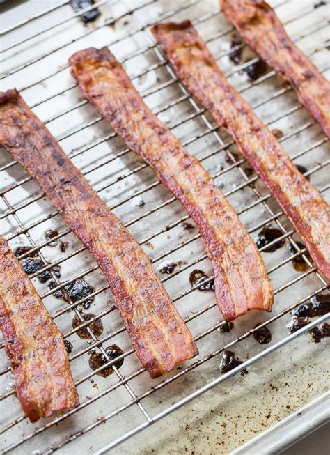 Line a rimmed baking sheet with parchment paper. How to Bake Your Bacon - The Mom 100 The Mom 100