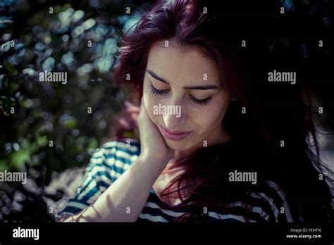 Depressed Melancholic Girl In A Forest In Autumn Red Long Hair Stock