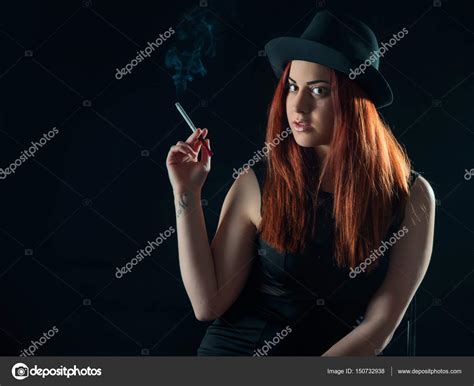 Sexy Girl Smoking A Cigar — Stock Photo © Baronb 150732938