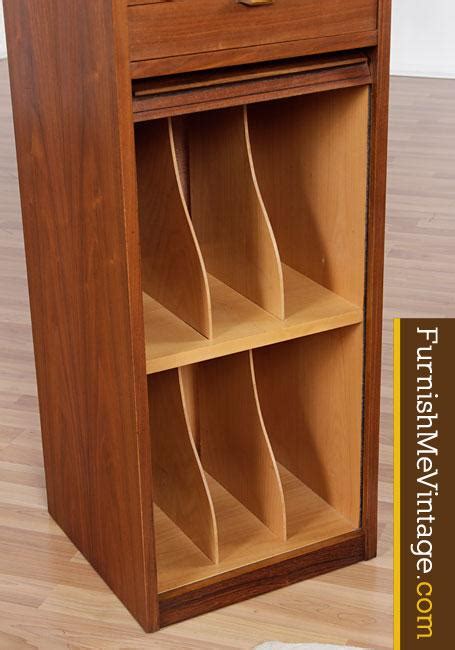 The cabinet has been stripped and refinished, great condition with just the odd mark due to age. Mid Century Modern Teak Record Cabinet or Filing Cabinet