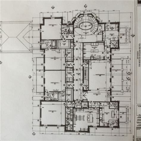 An Architectural Drawing Of A Building With Blueprints