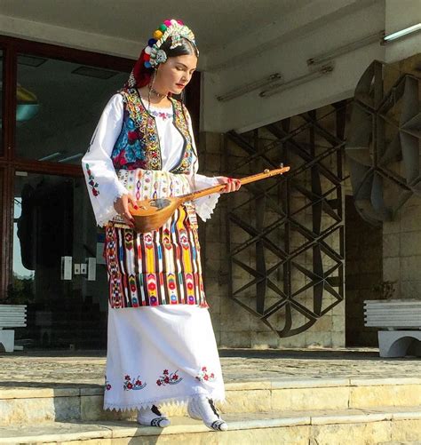Girl In Albanian Cultural Dress With Albanian Traditional Musical