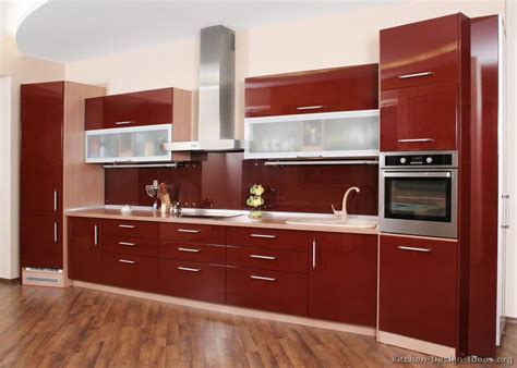 The recessed stainless steel handles also add a touch of 50s style to the kitchen, and, although the kitchen has a retro theme, it comes complete with neff appliances. Pictures of Kitchens - Modern - Red Kitchen Cabinets