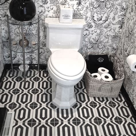 Black And White Modern Cement Tile Floor With A Traditional Toile Wall