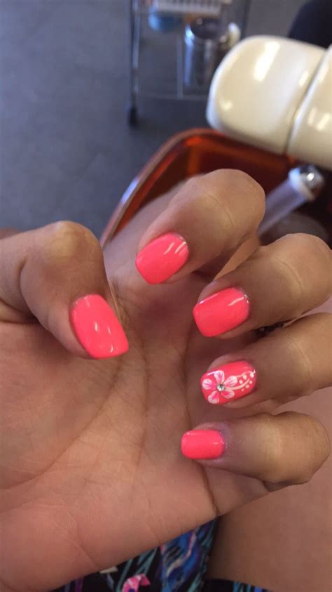 Flower nail art never goes out of style. Pink coral Hawaiian flower nails design art shellac gel ...