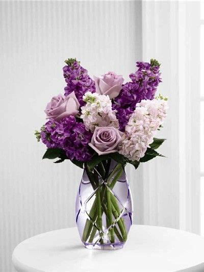 Birthday, get well, anniversary, thank you, housewarming Purple flowers and pink flowers arranged in a purple vase ...